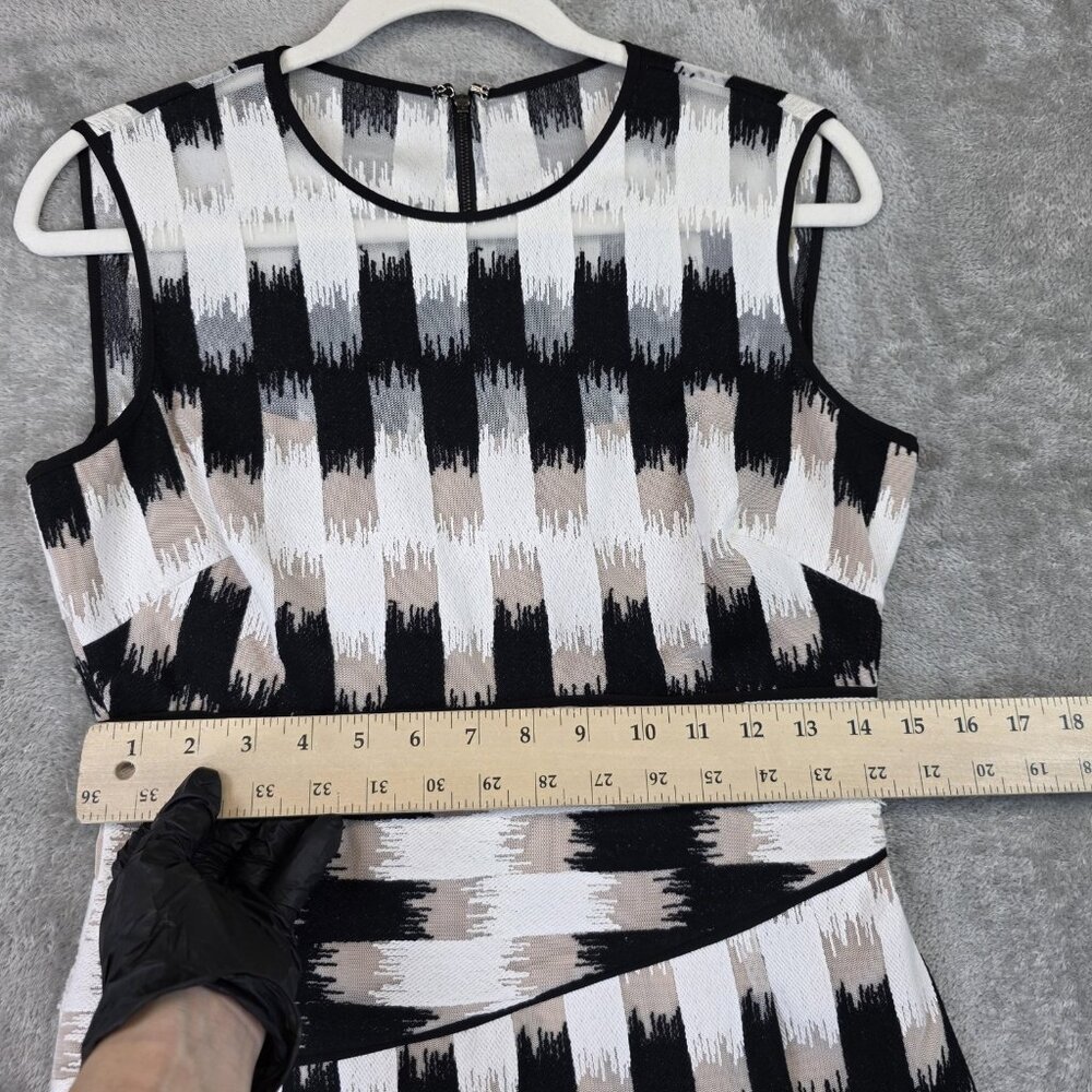 BCBGMAXAZRIA Blouse Womens S Black White Geometric Asymmetrical Peplum Top Lined - Picture 10 of 11